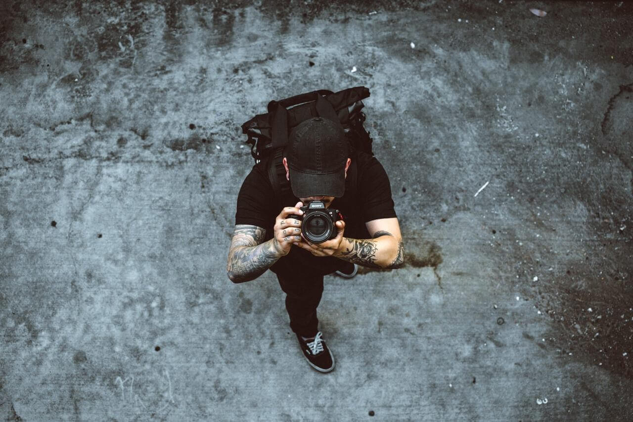 Image of a man with a camera
